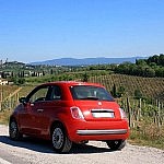 A cinquecento in front of San Gimignano