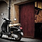 A vespa in the medieval village of Peccioli