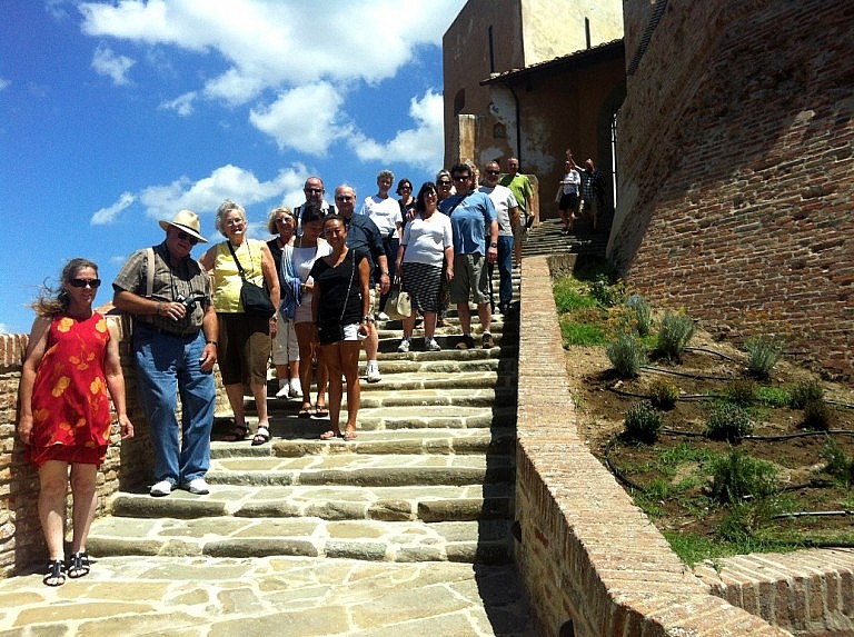 A group of visitors to the castle of Lari