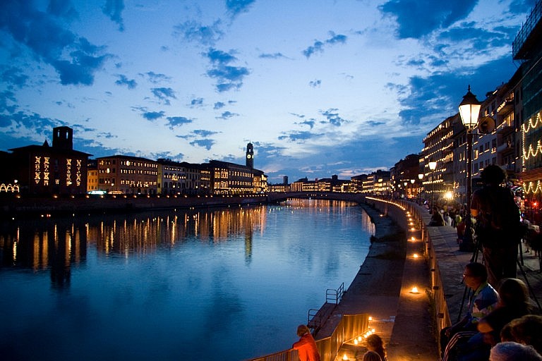 The spectacular view of the river banks in Pisa during luminara