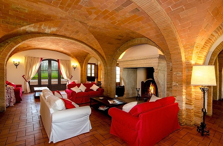 Charming living room with fireplace and vaulted ceiling