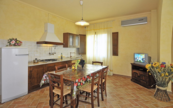 Dining room and kitchen in Tuscan farmstay