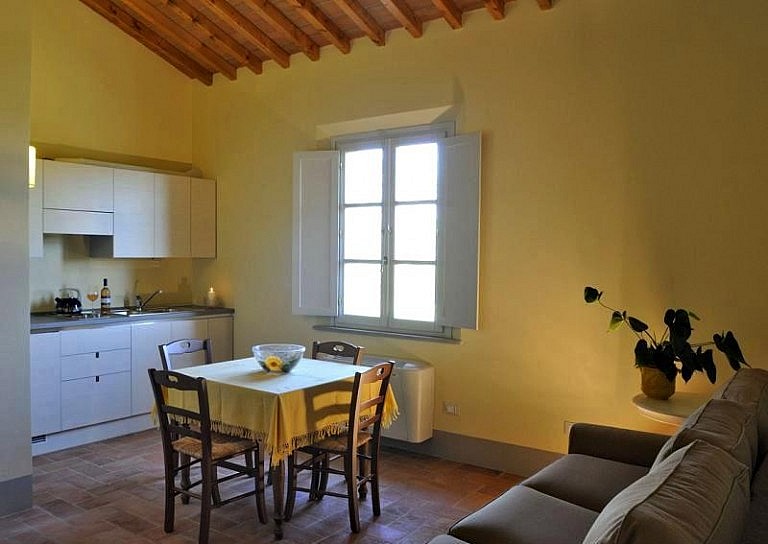 Kitchen and dining room in luxury country resort near Pisa