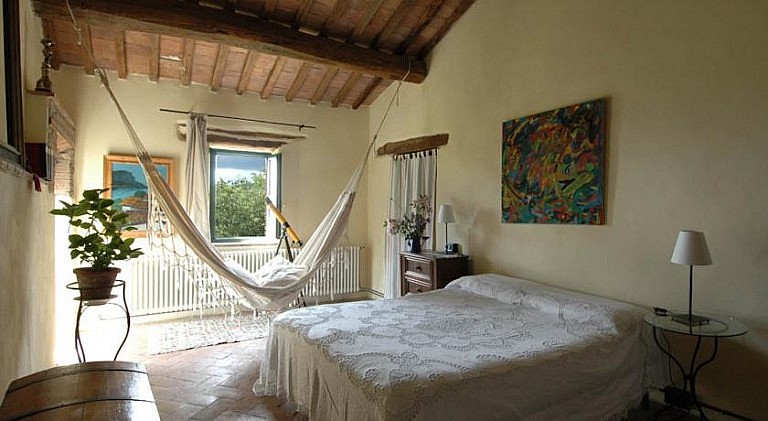 Bedroom in rustic Tuscan style