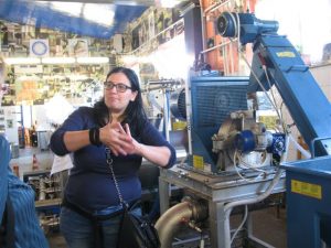 Arianna explaining how the olive mill works