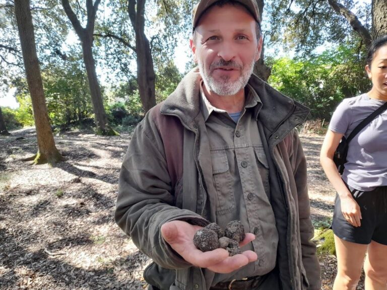 Daniele with black truffles in his hands
