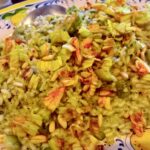 Risotto with zucchini and zucchini flowers sauce