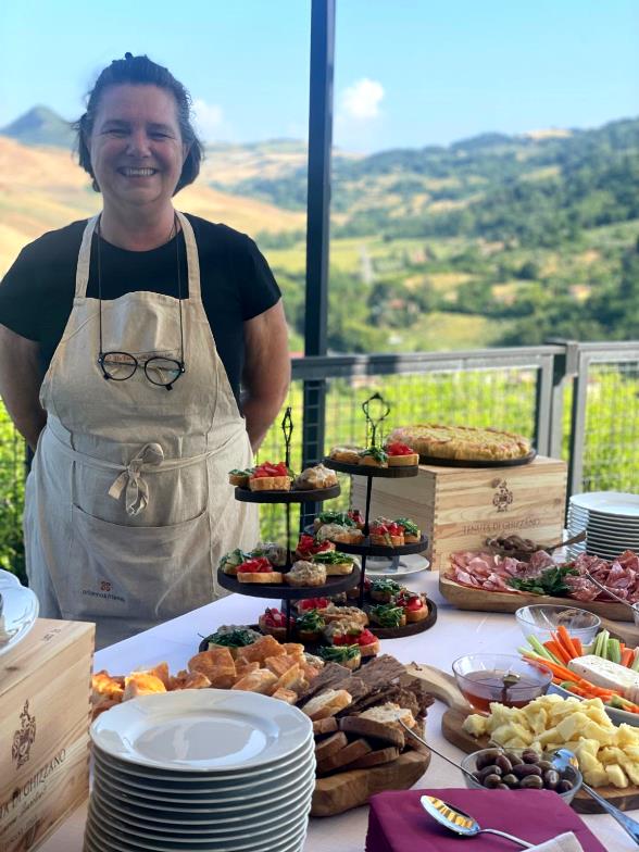 Our lovely mariagrazia serving a buffet dinner for our guests