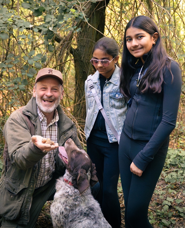 Our truffle hunter Daniele showing the beautiful truffles that the dog was able to find in the wood