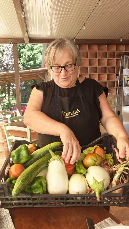 Annamaria showing her vegetables